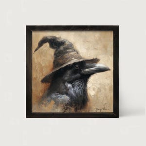 May include: A square framed painting of a black raven wearing a weathered brown pointed hat. The bird is shown in profile against a textured, neutral beige background with visible brushstrokes. The artist's signature is visible in the bottom right.