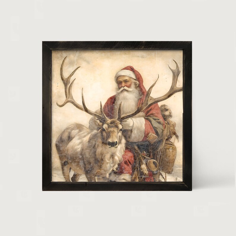 May include: A framed print featuring Santa Claus in a red suit and hat, with a long white beard, seated next to a reindeer with large antlers. The vintage-style artwork has a rustic, aged appearance, perfect for Christmas decor.