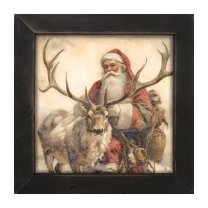 May include: A framed print depicts Santa Claus in a red suit and hat, seated on a sleigh pulled by a reindeer. The artwork has a vintage, watercolor style with a black wooden frame, evoking a classic Christmas theme.