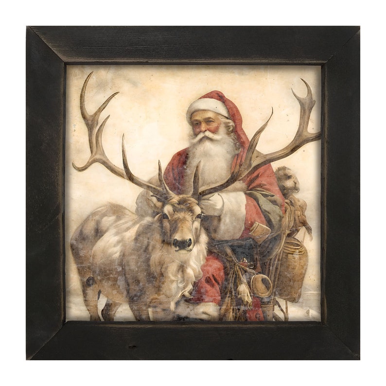 May include: A framed print depicts Santa Claus in a red suit and hat, seated on a sleigh pulled by a reindeer. The artwork has a vintage, watercolor style with a black wooden frame, evoking a classic Christmas theme.