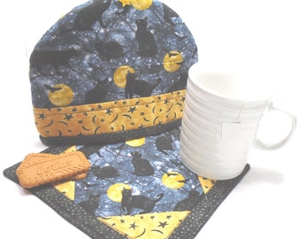 Handmade quilted mug cozy + matching mug rug/ mug mat/ mug trivet Halloween black cats moons stars black gray gold