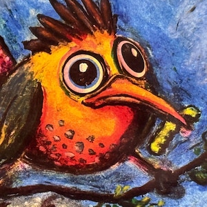 May include: A colorful, cartoon-style bird illustration. The bird has large, expressive eyes, an orange beak, and a vibrant mix of orange, yellow, and red feathers. It is perched on a branch against a blue background.