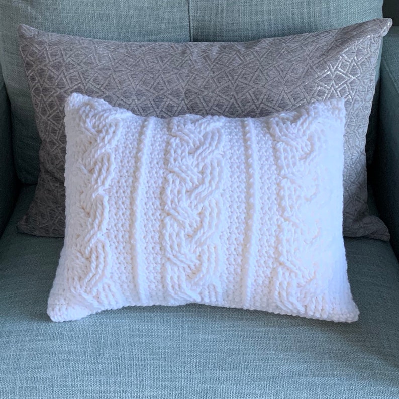 A Crochet Pillow Pattern White Braided Cables