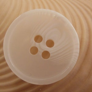 BUTTONS: White button,  2 sizes, striated, set of 24 buttons.