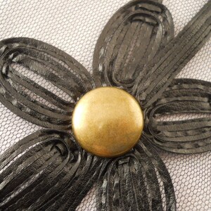 Unusual black floral trim,  4 inches wide.  One yard.
