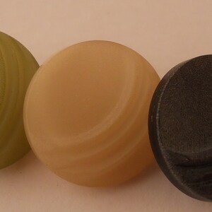 BUTTONS: Small self-shank style buttons. Charcoal,green or light taupe.  Matte finish surface detail. 1/2 inch size.  Set of 10 buttons.