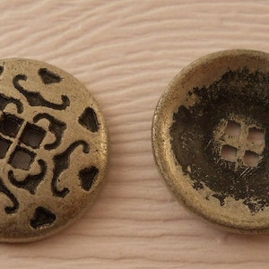 Mixed lot of vintage metal buttons, brass ones  just under 1/2&quot;, silver round  5/8 inch, odd shaped  1&quot; long. Over 3 doz. buttons total.
