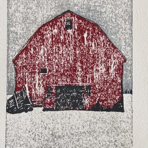 May include: A red barn with a white roof and a black door, set against a gray and white background. The barn is surrounded by snow. The text "52 OBJECT 5-58 1/4" is printed at the bottom of the image.