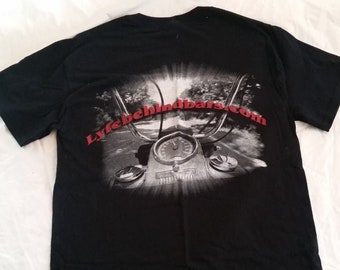 Natanic's "Lyfebehind Bars" T-shirt.  Single running, very limited supply!