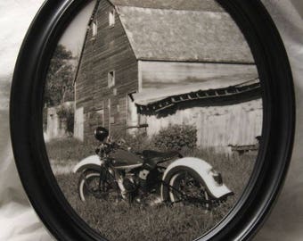 11x14 inch Framed oval print of vintage Harley motorcycle near an old barn