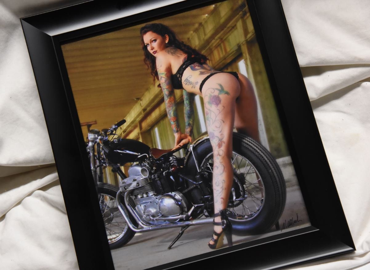 8x10 inch photo of an inked beauty with long legs on an Ariel motorcycle!