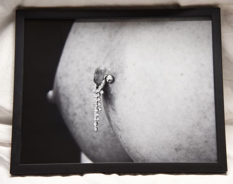 11x14 framed close-up photo of a wonderful set of breasts with nipple piercing image 1