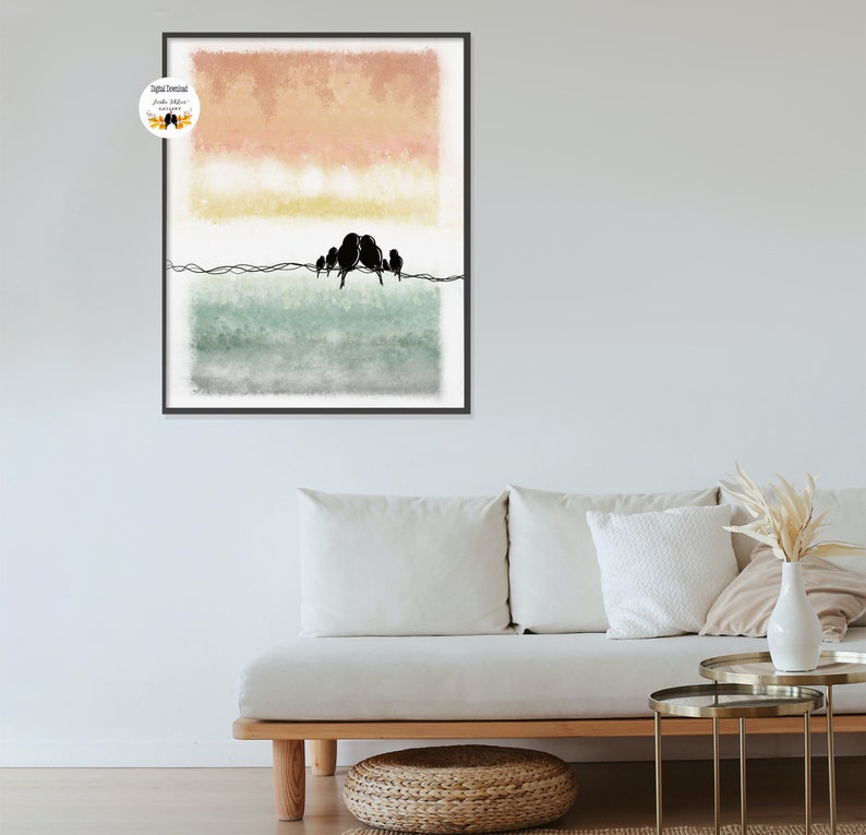 May include: Abstract watercolor painting with a muted color palette of peach, yellow, and green.  Silhouettes of birds are perched on a thin line across the middle of the painting.