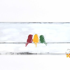 May include: A rectangular wooden sign with a distressed white finish featuring a painted black horizontal line with three birds perched on it. The birds are colored red, yellow, and green. The text Linda Fehlor GALLERY is printed in the bottom right corner.
