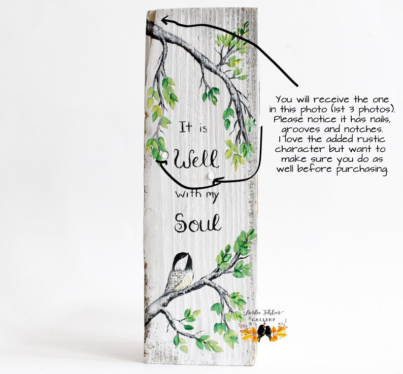 wood wall art featuring a sweet chickadee bird sitting on a tree branch with leaves that are shades of green and yellow, another branch hangs from above perfectly framing the comforting phrase It is Well with my Soul