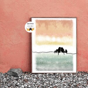 May include: A digital download print featuring a watercolor landscape with a sunset sky in shades of pink, orange, and yellow. A line of black birds sits on a wire in front of a green and blue watercolor background. The text "Digital Download" and "Jorda Studio Gallery" is visible in the image.