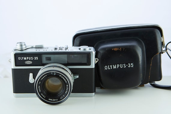 Filmkamera Olympus-35 LE. Objektiv 42mm f1.7. Funktionierende Filmkamera.  Kamera Olympus 35.