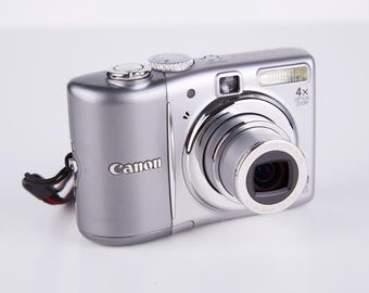 Canon IXY DIGITAL 910 IS 8MP 3.8x Zoom Compact Digital Canon IXY DIGITAL 910 IS 8MP 3.8x Zoom Compact Digital
