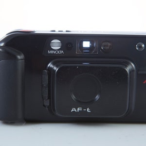 Film Camera Minolta AF-E II. 35 mm Film Camera Minolta AF. Point and Shot Camera. Working Film Camera.