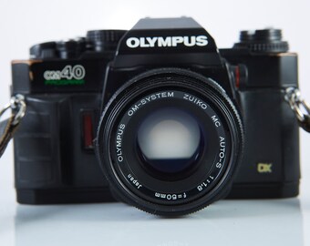 オリンパス OM40 プログラムフィルムカメラ：50mmレンズ、実用一眼レフ