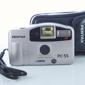 Vintage camera Pentax PC-55. Film Camera Pentax. Point and Shot Camera. Lens 30mm. Working Film Camera.