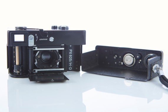 Film Camera Rollei 35 T. Lens Tessar F/3.5 F=40mm. Working