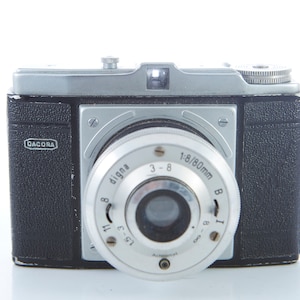 Appareil photo Dacora vintage. Rouleau de film 120 mm pour appareil photo 6 x 6 cm. Années 50. Ne fonctionne pas.