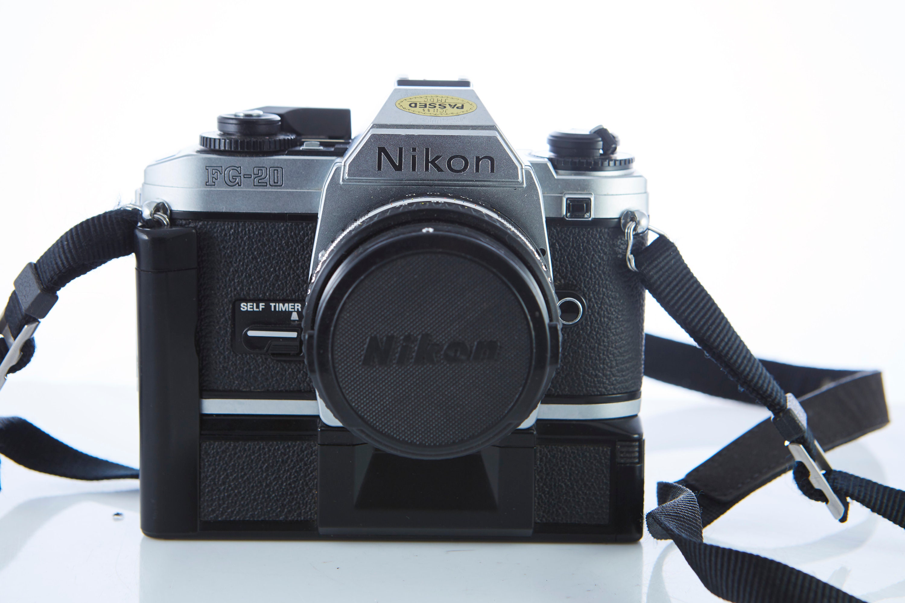 Film camera Nikon FG-20.Lens Nikon 50mm /1,8. SLR Film Camera. Working Film  Camera.