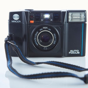 Film Camera Minolta AF-S. 35 mm Film Camera Minolta AF. Point and Shot Camera. Working Film Camera.