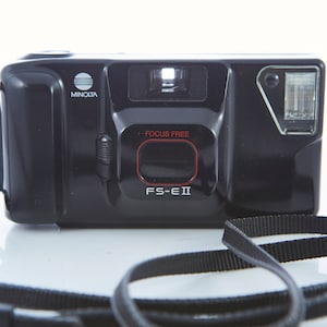 Film Camera Minolta FS-E II. 35 mm Film Camera Minolta FS. Point and Shot Camera. Working Film Camera.