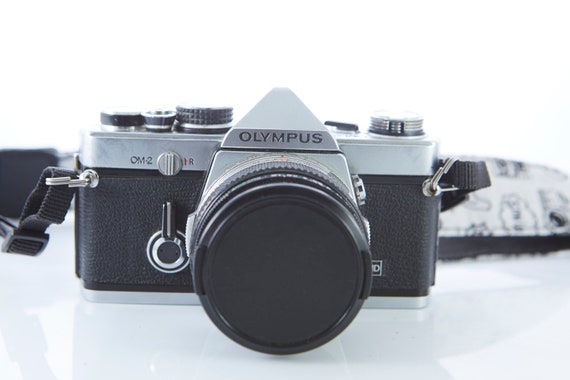 Film camera Olympus OM-2. Lens Olympus OM-System Zuiko Auto