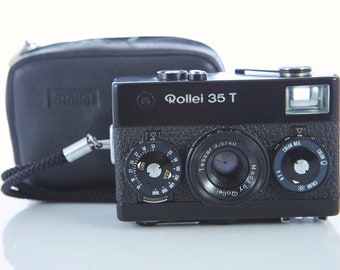 Film camera Rollei 35 T. Lens Tessar f/3.5 f=40mm. Working Film camera. Rollei 35 camera.