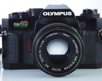 オリンパス OM40 プログラムフィルムカメラ（50mmレンズ付き） - Etsy 日本