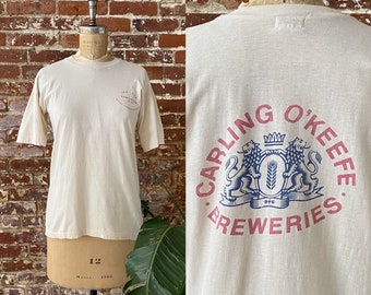 Vintage 1976 Carling O'Keefe Breweries Beer IRA-CRA Edmonton Western Canadian Regionals Beige T-Shirt - Single Stitch - Small Short Mens