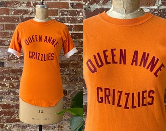 Camiseta de educación física vintage de los años 60 de los Queen Anne Grizzlies, de doble cara, naranja y blanca - Algodón - Talla XS para hombre / Talla S para mujer 43 x 69 cm