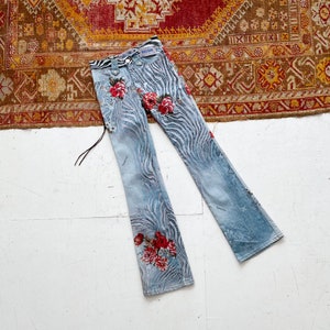 Women's embroidered bell bottom jeans discount