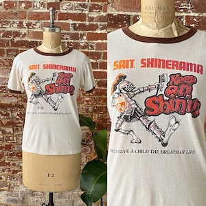 Vintage vroege jaren 80 tandenborstelring T-shirt - jaren 80 beige bruin Keep On Shinin Cartoon tand T-shirt - enkele steek 50/50 - klein 17,5 x 24"
