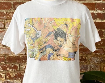 Vintage 90-tals Dragon Ball Z T-shirt - Tillverkad i USA/Kanada - Ungdomsstorlek Large - Vuxen Small Kortare Passform 46 x 61 cm