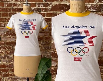 Vintage Los Angeles '84 Levi's Olympische Ringer Tee - Geel Ringer Tee - 50/50 Single Stitch Made in Canada - Heren XS Short Fit