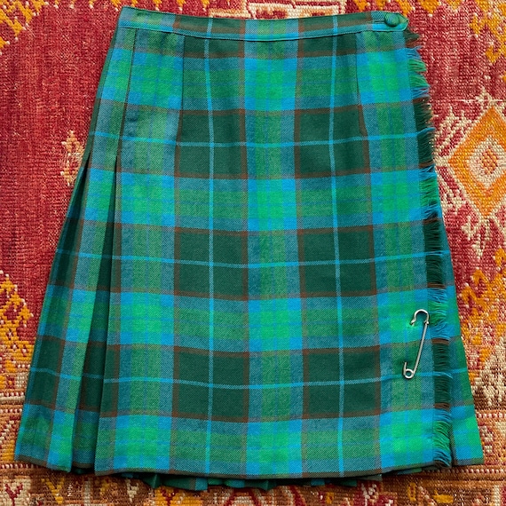 Green plaid skirt 7 little words online