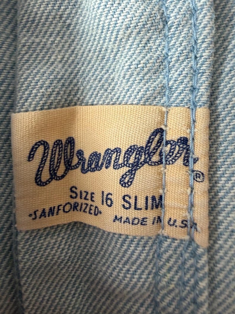 Jeans Wrangler vintage de los años 60 con etiqueta de cuerda, corte pitillo, piel sanforizada, tiro alto, pierna cónica, talla pequeña: 66 cm de cintura, 99 cm de cadera. imagen 10