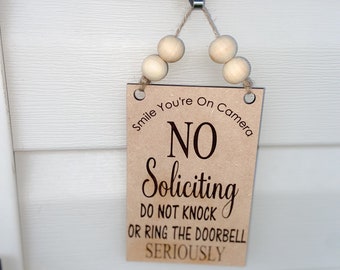 Laser engraved No Soliciting sign