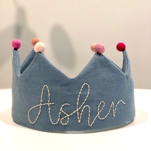 Blue Linen Birthday Crown, personalised with name, with felt Pom poms.