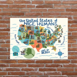 May include: A colorful map of the United States with the text "the United States of NICE HUMANS." Each state is illustrated with whimsical drawings of animals and landmarks. The map includes the Pacific Ocean, Atlantic Ocean, Great Lakes, and Gulf of Mexico.