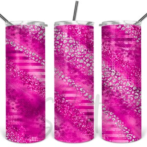 May include: Three stainless steel tumblers with pink and silver glitter designs. The tumblers have a straw and lid.
