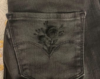 Hand embroidered rose Levi’s jeans size 28