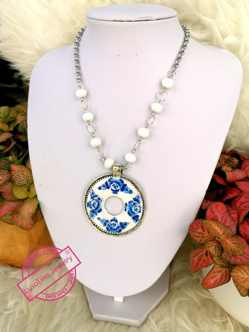 Elegant short necklace with silver finish stainless steel medallion, replica details of Portuguese blue tiles and bench image 1