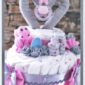 Diaper cake girl pink and gray with dinosaur made of baby washcloths and heart pacifier image 1