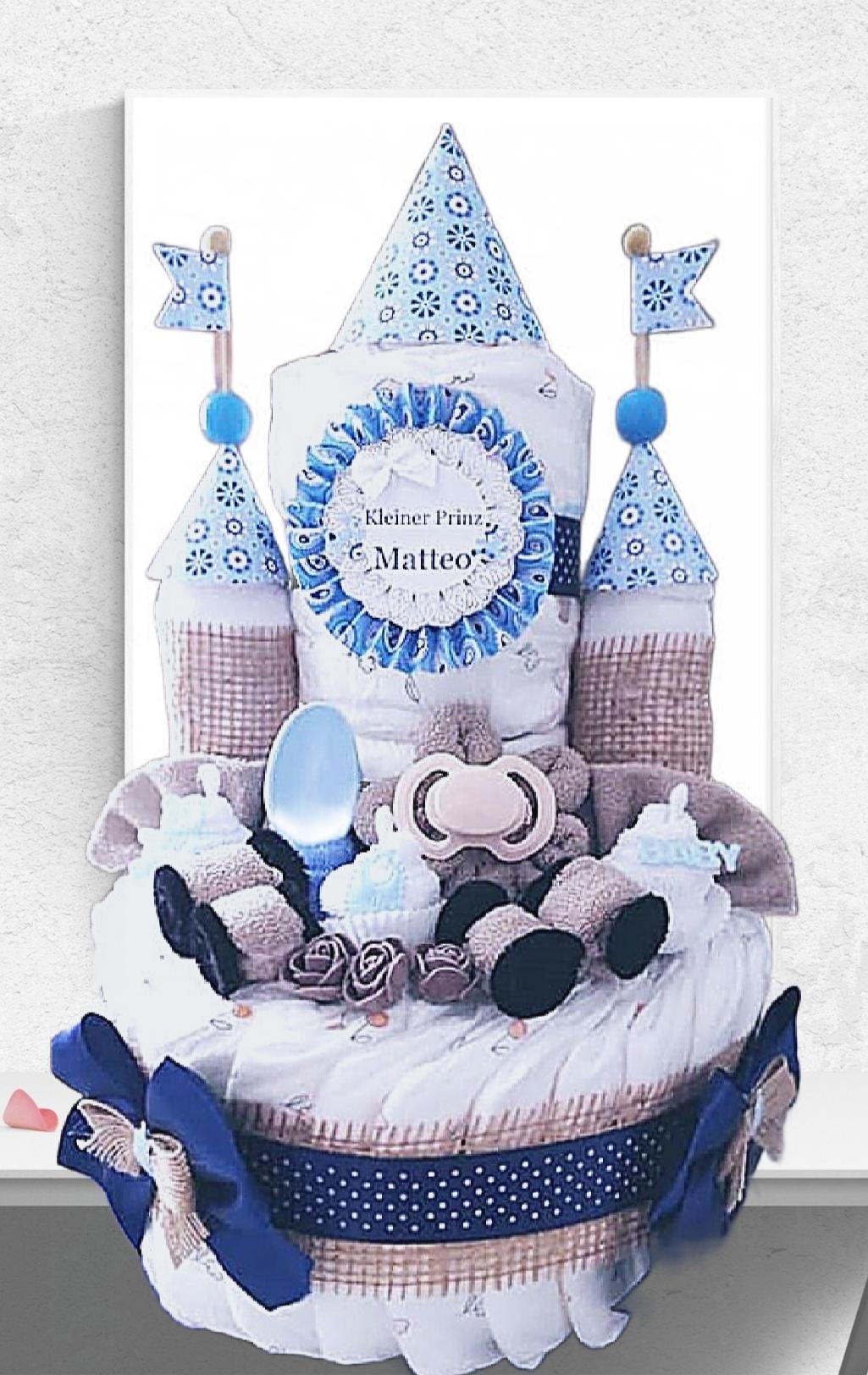 Diaper cake in blue boys diaper castle with car and pacifier