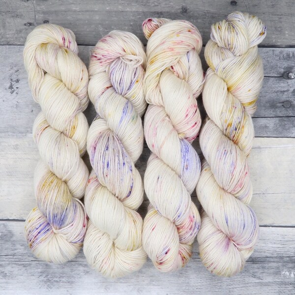 Luna - (Silk Sock (50/50 SW Merino/Silk, variegated) - delicately speckled pink, blue-violet, and warm yellow